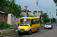 БАЗ-2215 гос.# АХ9130СА 233-го маршрута на улице Моисеевской перед перекрестком с улицей Якира