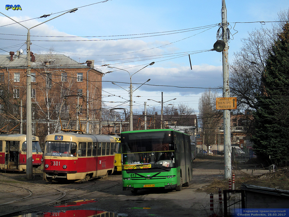 Богдан-А601.10 гос.# АХ0530АА и Tatra-T3SU #3301 на улице Смольной на территории вагоноремонтного завода