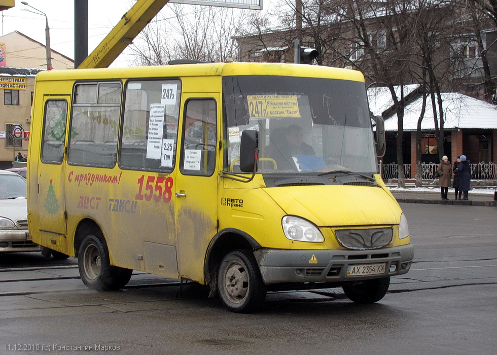 Тур-А049.12 гос.# АХ2354ХХ 247-го маршрута на проспекте Гагарина на перекрестке с улицей Кирова