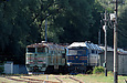 ТЭП70-0075 и 2ТЭ116-1069 на территории Базы запаса локомотивов ЮЖД на разъезде Мжа