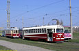МТВ-82 #55 и вагон "Х" #100 в открытом парке Салтовского трамвайного депо
