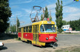 Tatra-T3SU #3057 20-го маршрута следует по улице Клочковской через пересечение с улицей Завода "Комсомолец"
