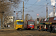 Tatra-T3SU #3085-3086 6-го маршрута и Tatra-T6B5 #4557 8-го маршрута на Салтовском шоссе пересекают проспект Тракторостроителей