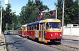 Tatra-T3SU #313-314 15-го маршрута на улице Шевченко подходит к остановке "Мост им. Чигирина"