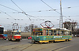 Tatra-T3 #6957 5-го маршрута и Tatra-T6B5 #4547 27-го маршрута на площади Восстания