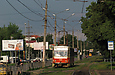 Tatra-T6B5 #4551 5-го маршрута на улице Плехановской выполняет остановку "Станция метро "Завод им. Малышева"