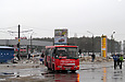 Богдан-А09202 гос.# AX1586CH на улице Героев труда отправляется с парковки супермаркета "Караван"