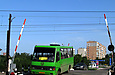 БАЗ-А079.14 гос.# AX0319AA 232-го маршрута на улице Некрасова пересекает железнодорожный переезд