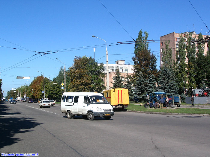 ГАЗ-32213, гос.# 001-76ХА, маршрут 261т, поворачивает с проспекта Косиора на проспект Фрунзе