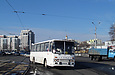 Ikarus-255.70 гос.# 159-00ХА поворачивает с Нетеченской набережной на площадь Бугримовой