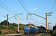 ЧС7-103 с ЧС4 и пассажирским поездом на перегоне Новая Бавария — рзд Коммунар проходит о.п. Пост 21 км
