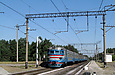 ЭР2-572 поезд №6859 на перегоне Основа — Терновое отправляется от платформы 5 км