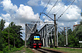 Эр-794-12 с ретро-поездом в районе поста 6 км следует по мосту через реку Лопань