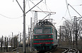 ВЛ82м-040 с грузовым поездом на перегоне разъезд 10 км — Люботин в районе платформы Водяное