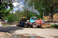 Харьковская набережная, демонтаж трамвайной линии. Трактор Т-150К буксирует МГП-154