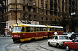 Tatra-T3SU #3003-3004 7-го маршрута поворачивает с площади Розы Люксембург на улицу Университетскую