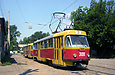 Tatra-T3SU #3011-3012 3-го маршрута на улице Кривомазова отправляется от конечной станции "Новоселовка"