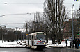 Tatra-T3SUCS #3047 27-го маршрута на улице Героев труда пересекает улицу Гвардейцев-Широнинцев