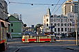 Tatra-T3SUCS #7050 5-го маршрута на площади Розы Люксембург пересекает улицу Университетскую