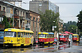 Tatra-T3SU #474 2-го маршрута, #277 14-го маршрута, #681 2-го маршрута и учебный #0301 на улице Кирова перед перекрестком с проспектом Гагарина
