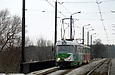 Tatra-T3SU #513-514 26-го маршрута на улице Героев труда следует по Лазьковскому мосту
