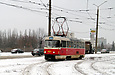 Tatra-T3SU #637 27-го маршрута поворачивает с проспекта Тракторостроителей на Салтовское шоссе