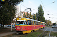 Tatra-T3SU #695-696 6-го маршрута на улице Героев труда пересекает улицу Гвардейцев-Широнинцев