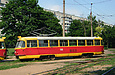 Tatra-T3SU #700 в составе сцепки #699-700 поворачивает с Салтовского шоссе на проспект Тракторостроителей