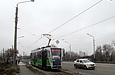 Т3-ВПНП #575 маршрута 16-А на улице Моисеевской съежает с Моисеевского моста