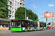 ЛАЗ-Е301D1 #3210 34-го маршрута на улице Блюхера на остановке "Проспект Тракторостроителей"