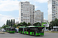 ЛАЗ-Е301D1 #3210 42-го маршрута и #3209 34-го маршрута на улице Валентиновской пересекают улицу Академика Павлова