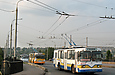ЗИУ-682 #0312 и #815 на проспекте 50-летия СССР следуют по Московскому путепроводу
